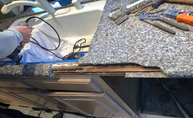 Sink rod failure caused major damage to this granite countertop.