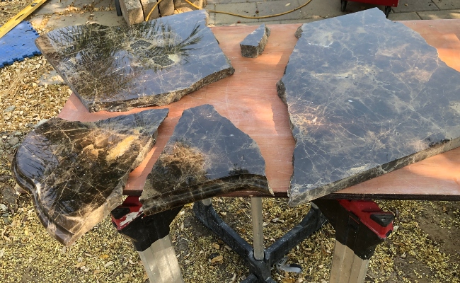 Shattered pieces of an antique marble furniture top.